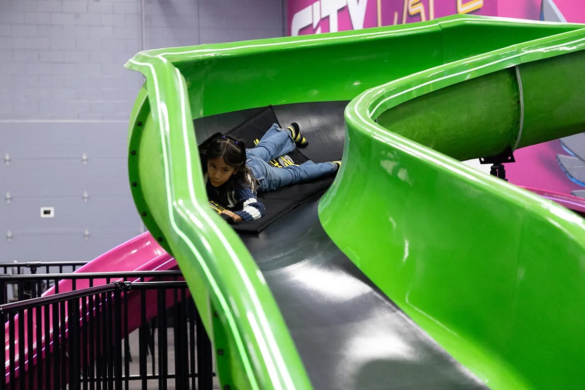 kid going down cowabunga slide