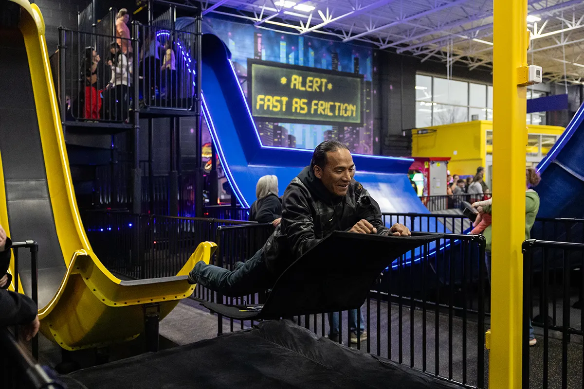 adult at mega launch slide