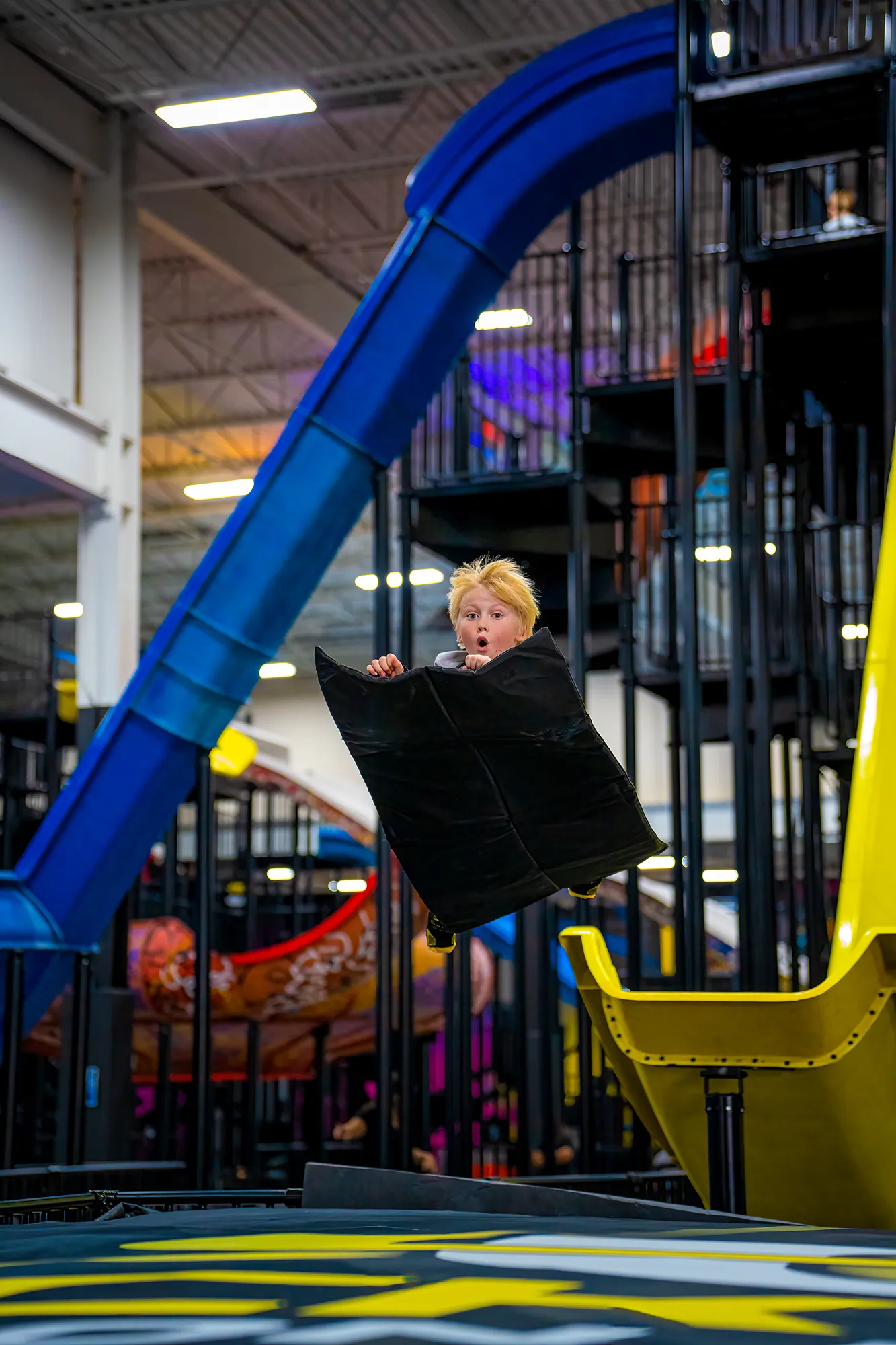 child on mega launch at slick city