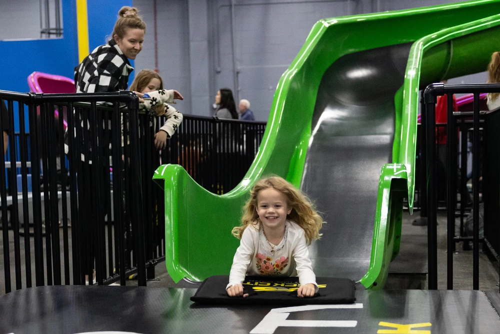 young girl on Cowabunga slide at Slick City Action Park in Pigeon Forge TN